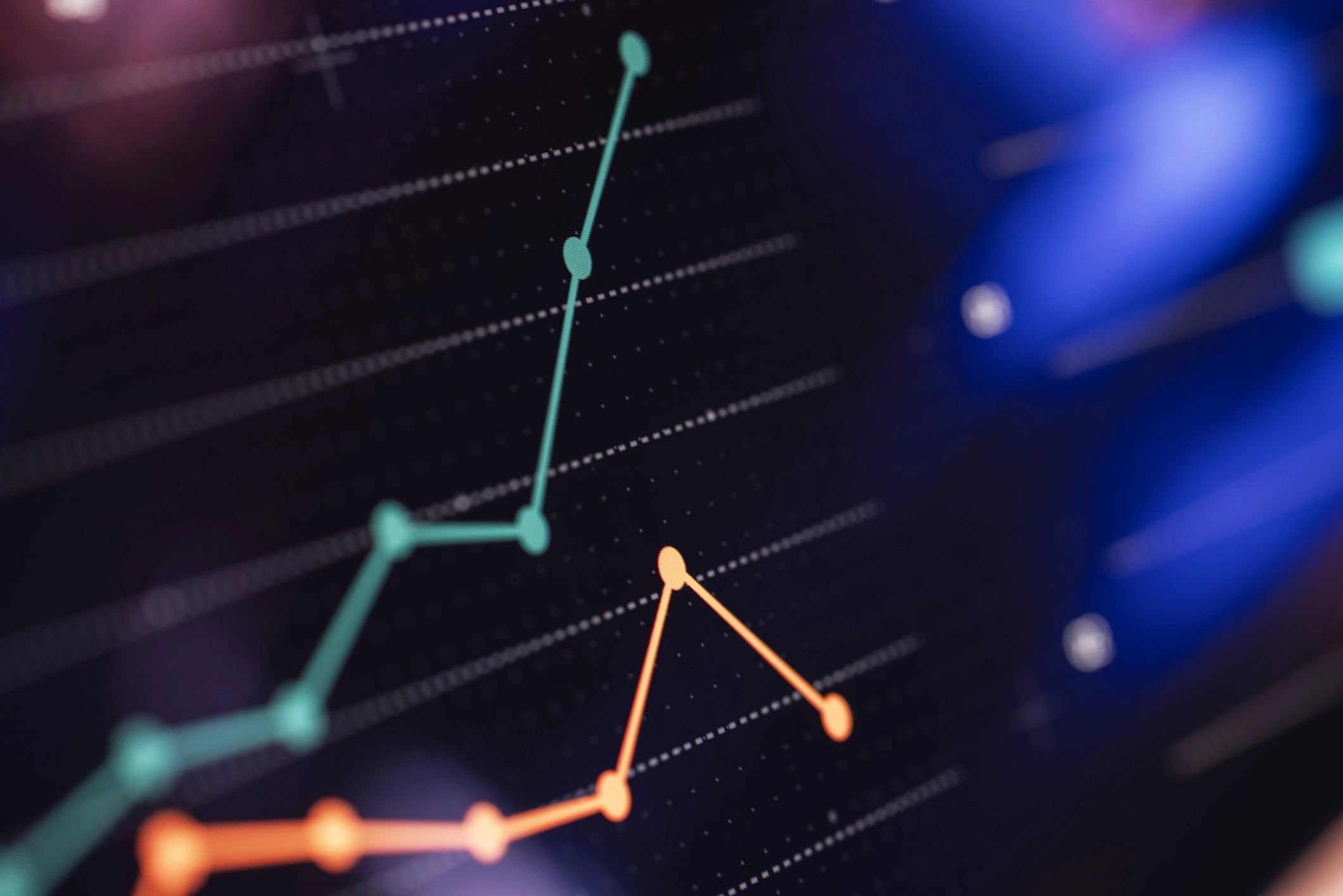 Line charts on a dark analytics dashboard